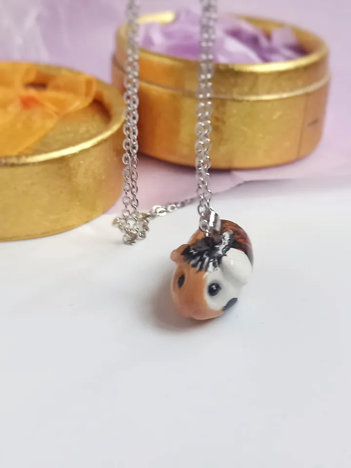 a Guinea pig necklace (US discount)