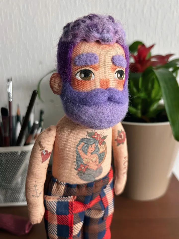 Textile doll sailor with purple beard