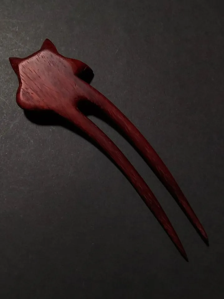 Carved wooden hairpin with a fox.