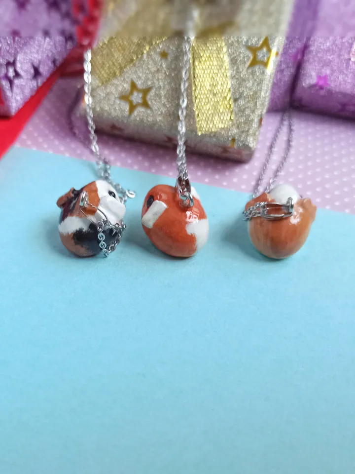a Cute Guinea pig ball necklace in random color  (US discount)