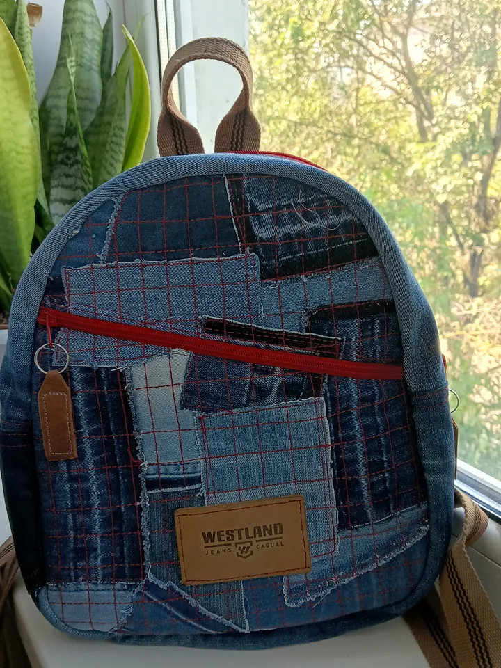 Stylish HANDMADE denim BACKPACK WITH a DEEP POCKET IN THE FRONT IN the lazy boro Patchwork STYLE