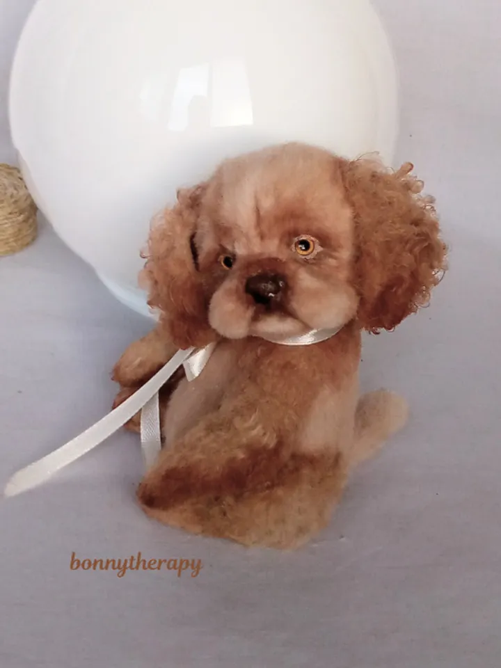 A cute puppy is waiting for you.
