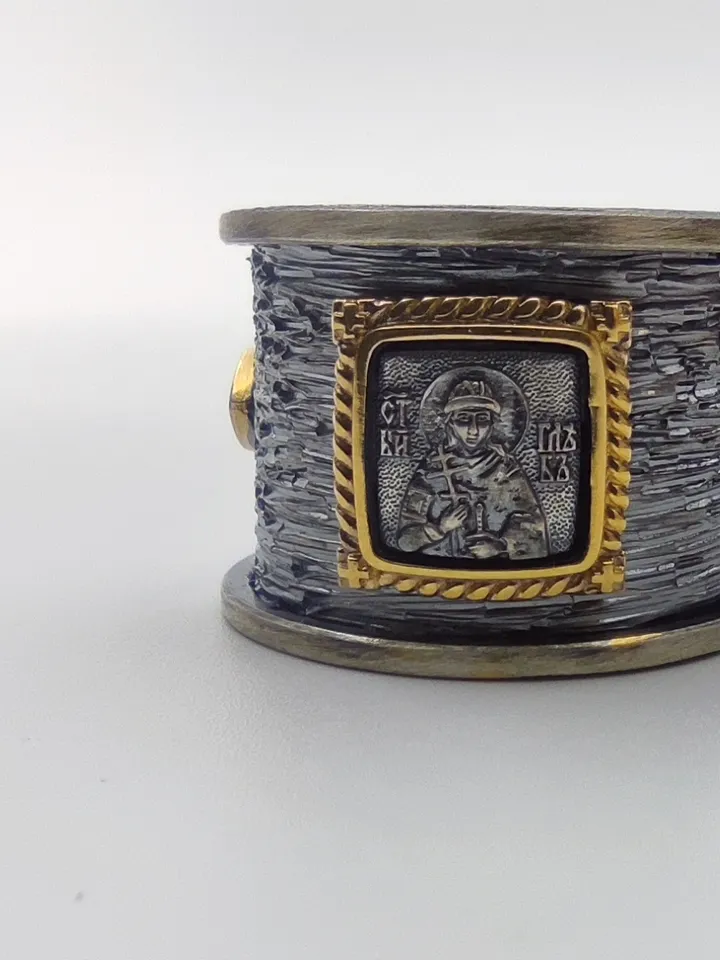 Gorgeous ring with faces of saints