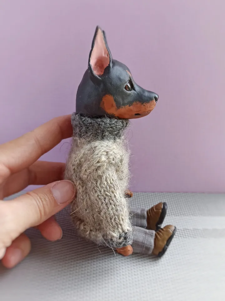 a doberman pinscher doll