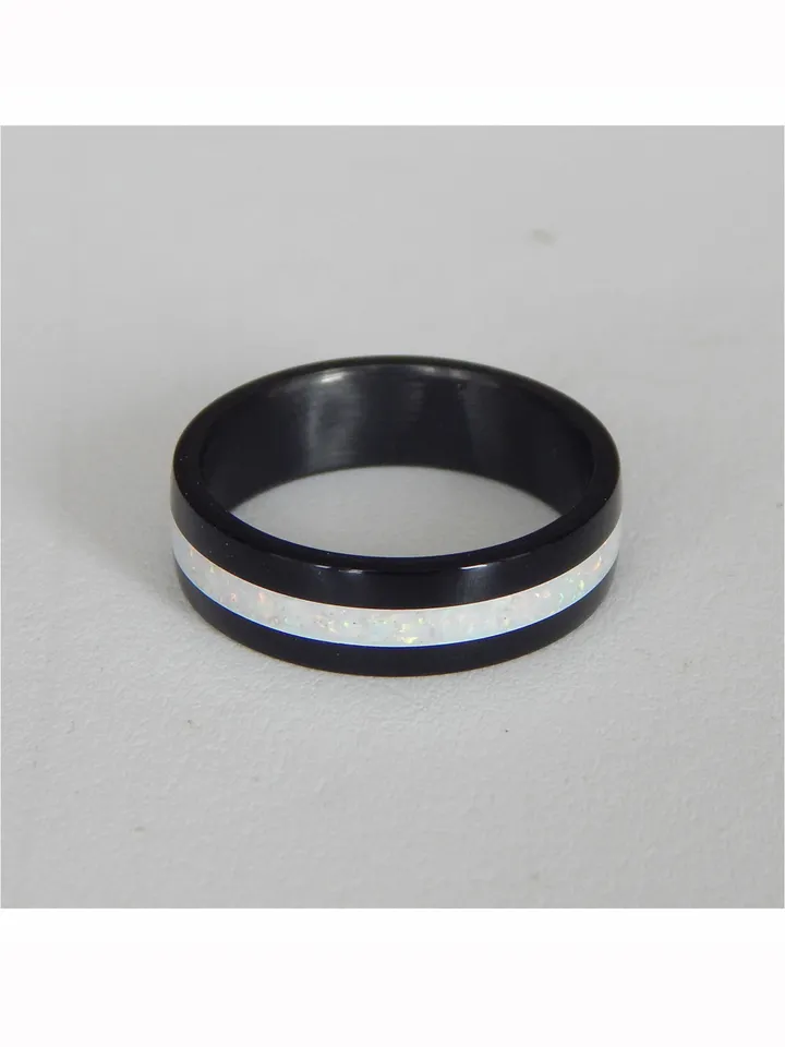 Stylish black ring. Carbon ring with synthetic opal. 8