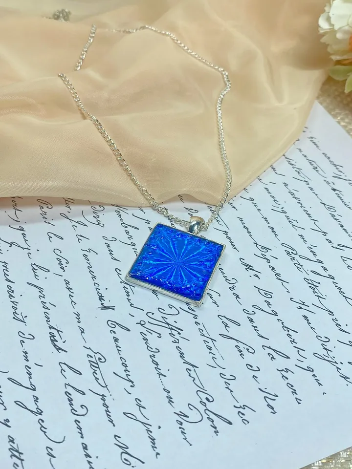 Bright blue 3D handmade pendant. Author's design. Handmade.