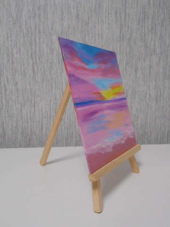 A pink sea sunset. Oil painting.