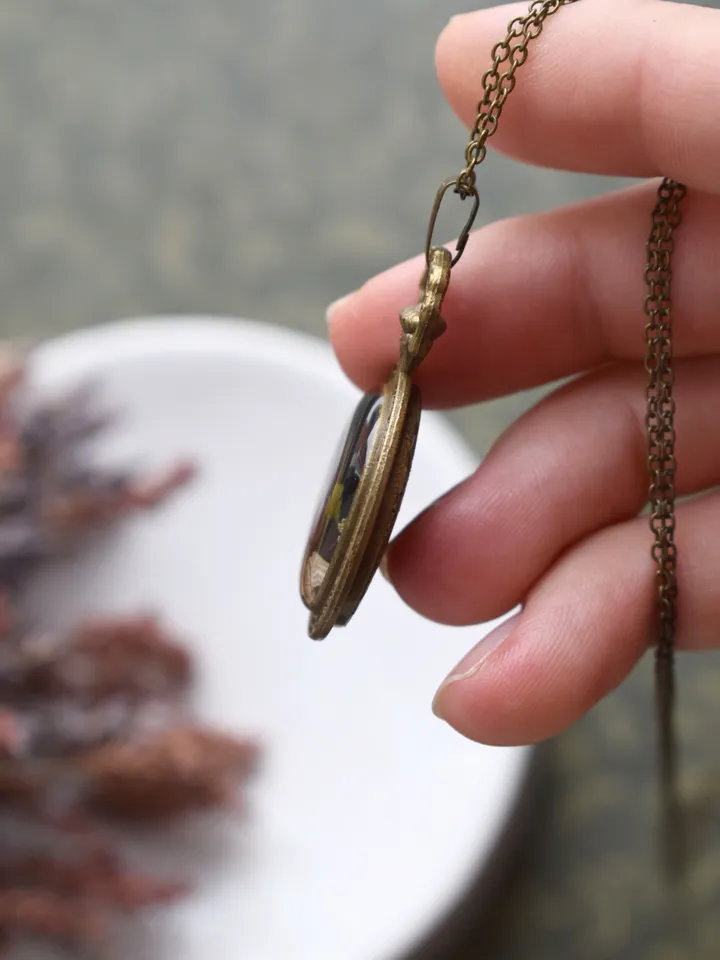 Pendant mushrooms in resin. Necklace with real mushrooms. Necklace with a forest composition.