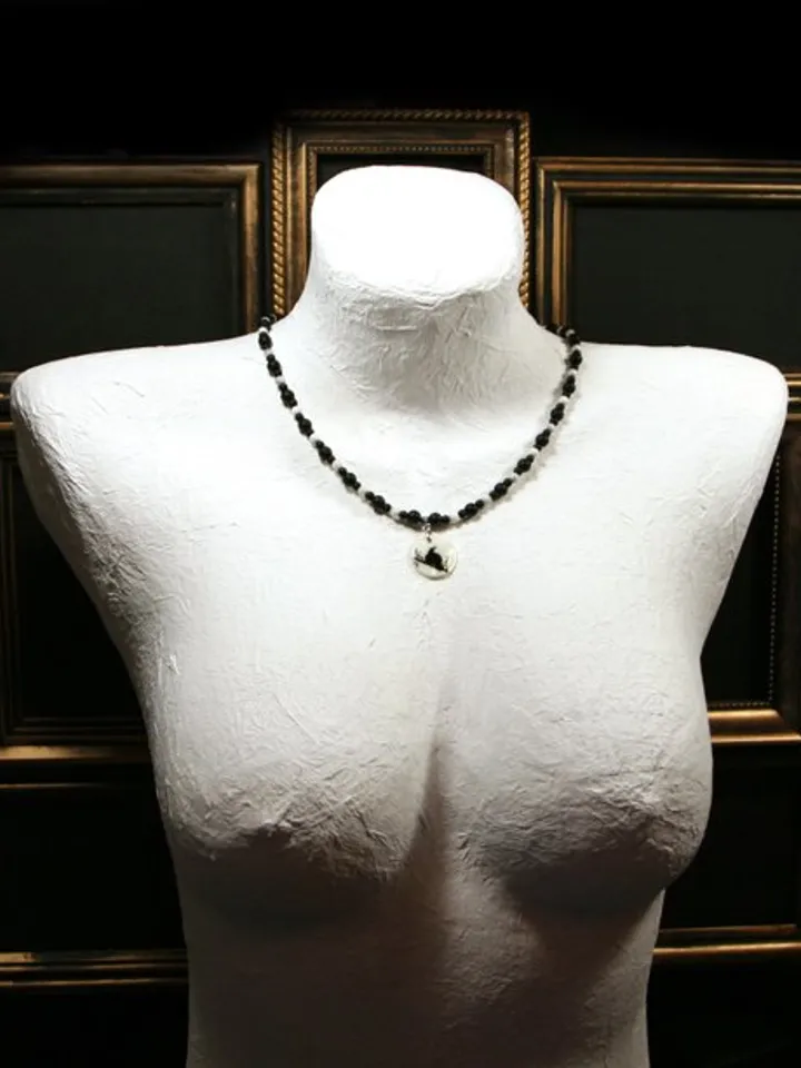Raven or crow necklace with love rune on the other side. Nacre pearl pendant