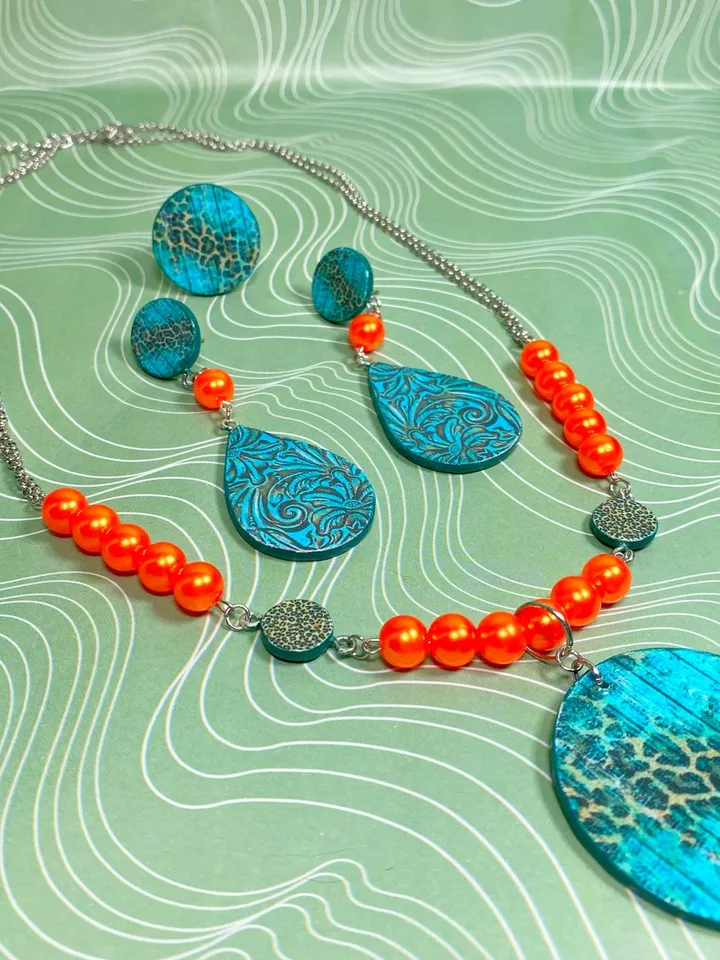 Bright set of handmade jewelry. Individual design.