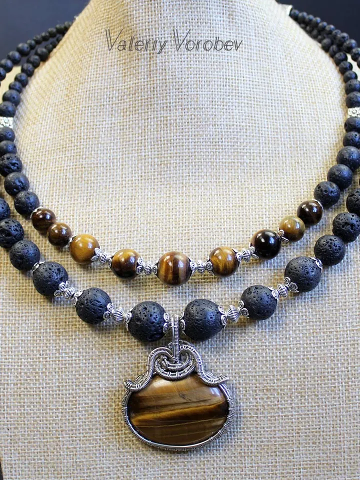 Necklace made of natural stones volcanic lava and tiger eye.