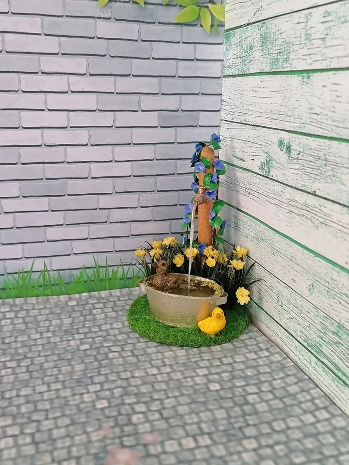 Composition for a puppet garden. Dollhouse miniature 1:12.