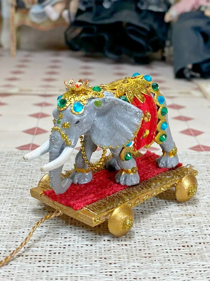 Elephant on a cart. Miniature. 1:12. Toy for a doll. Elephant. Animal for a doll.