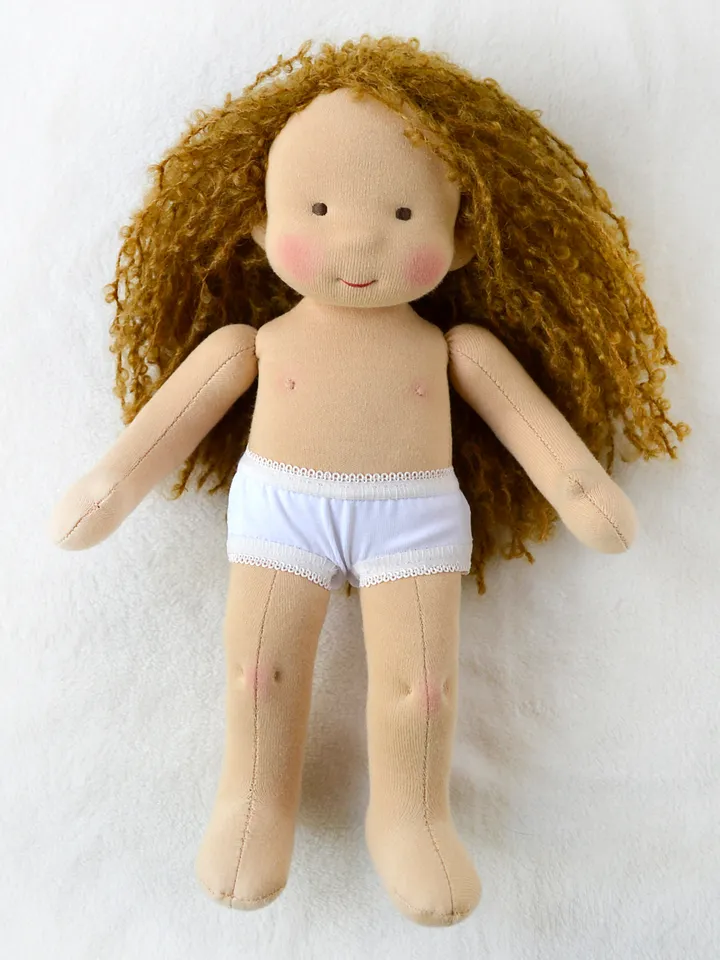 DIY clothes set for a Waldorf doll 11 inch (28 cm) tall. PDF sewing patterns and tutorials.