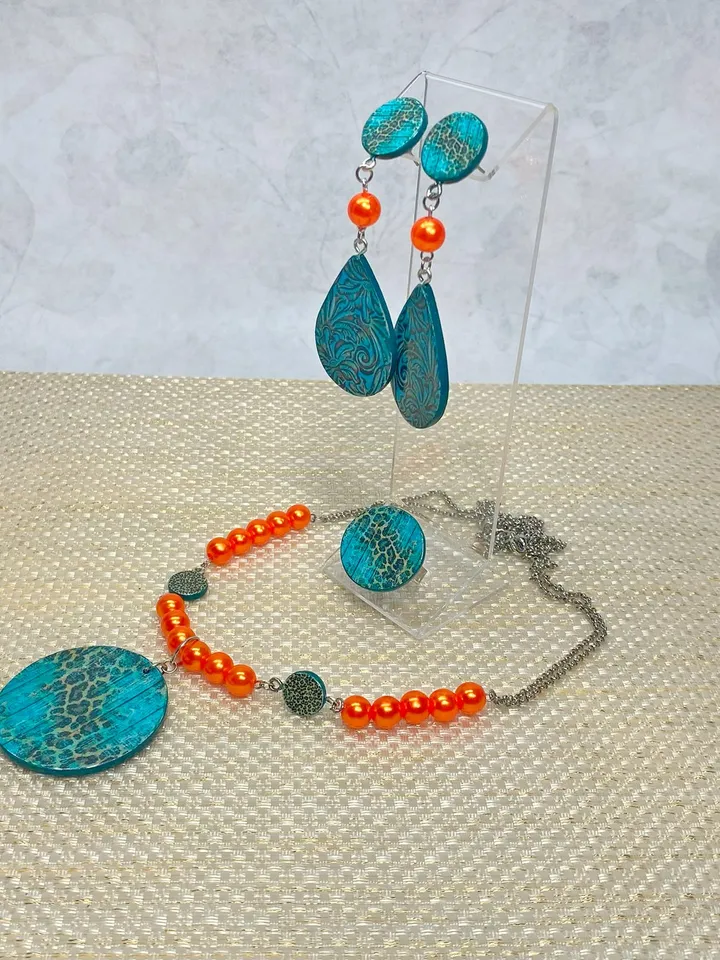 Bright set of handmade jewelry. Individual design.