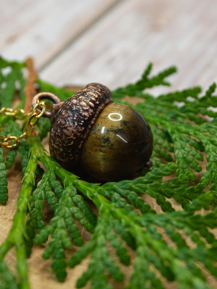 An original handmade electroformed copper pendant made from natural acorn caps in a single copy.