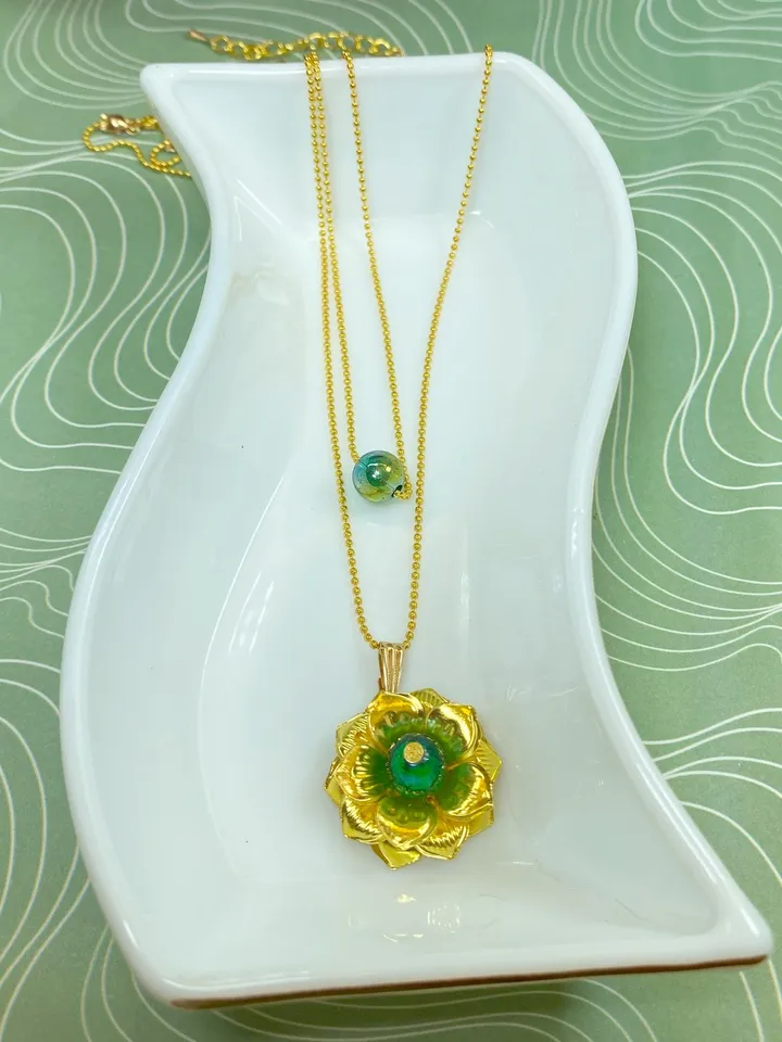 Pendant on a chain for the neck. Handmade jewelry.