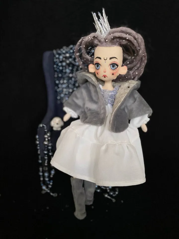 White Queen doll with dreadlocks and tattoos