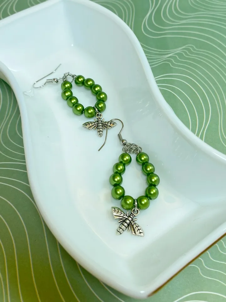 Earrings with green flies. Handmade jewelry.