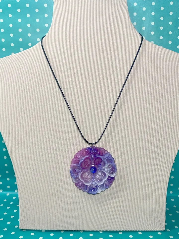 Pendant with cord. Handmade.