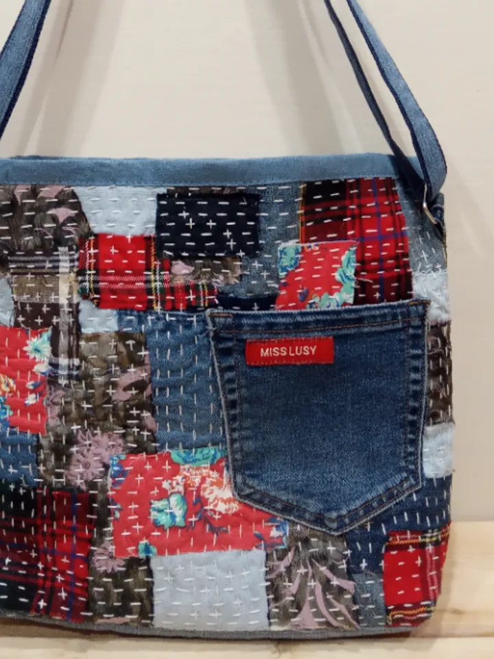 Pretty quilted handbag in the patchwork and boro style made of pieces of denim and cotton