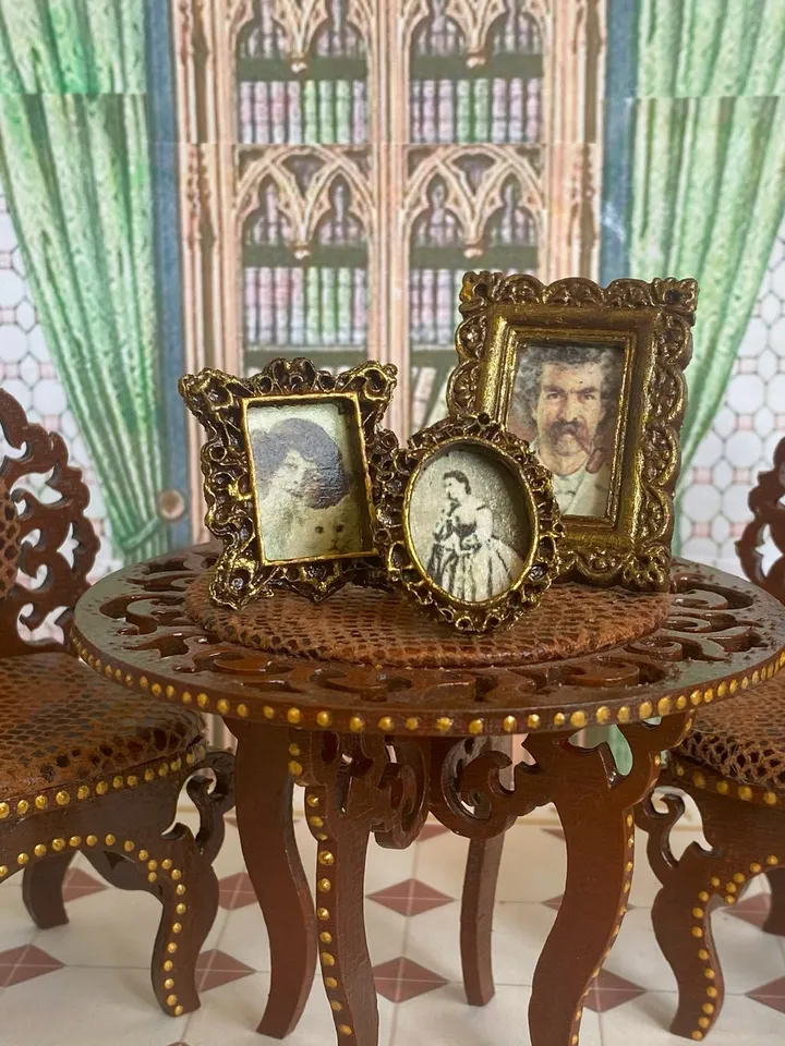 A set of photo frames for a dollhouse. Dollhouse miniature. 1:12. Dollhouse accessories.