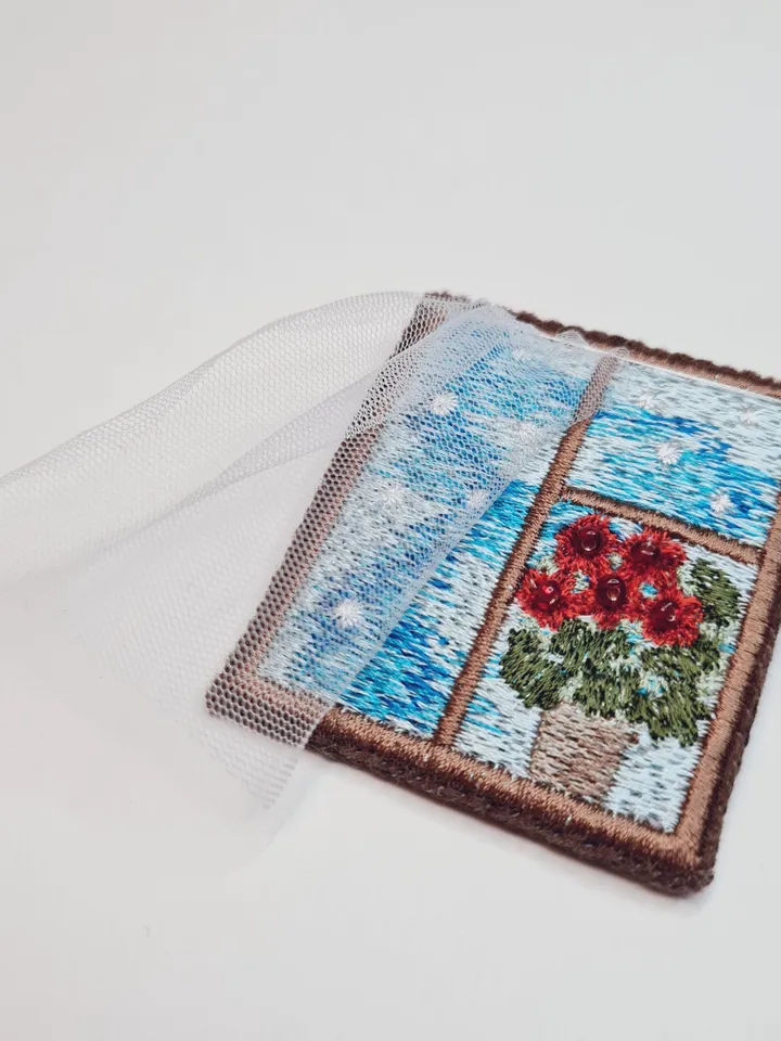 Machine embroidery design for art therapy: Brooch "Window with a flower"