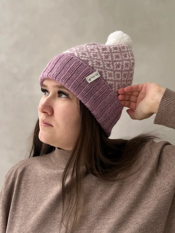Warm womens hand-knitted hat