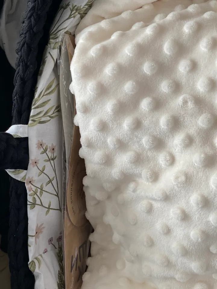 Knitted baby cradle