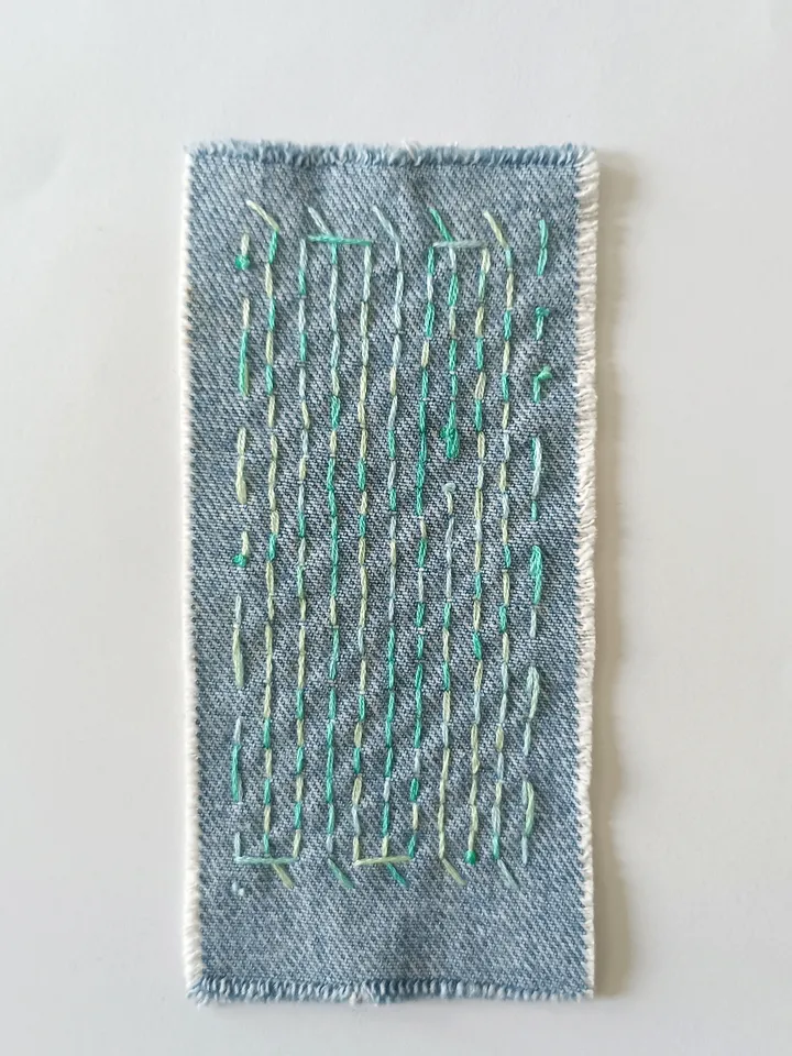 Sashiko patch hand sewn from recycled denim.