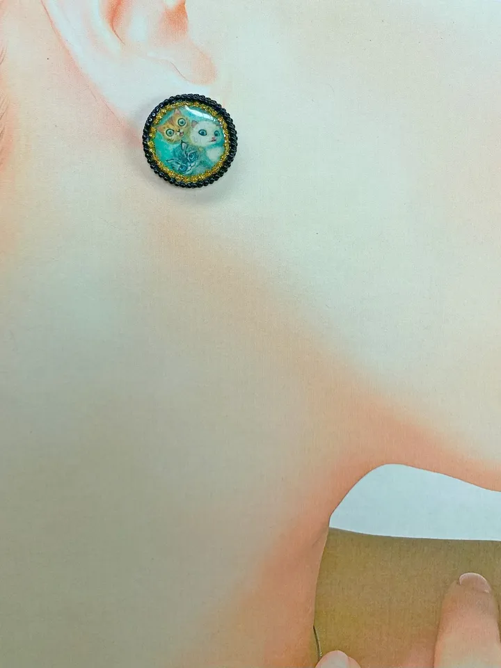 Handmade stud earrings. Earrings with images of cats.