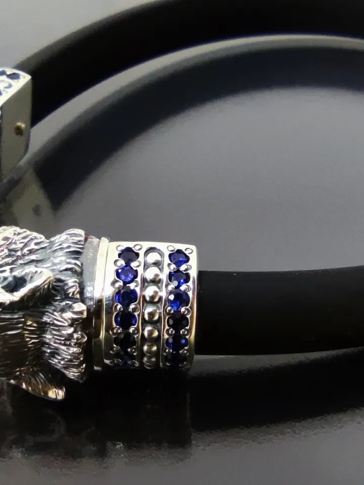 Luxurious bracelet Wolves - inlaid with natural sapphires, rubies