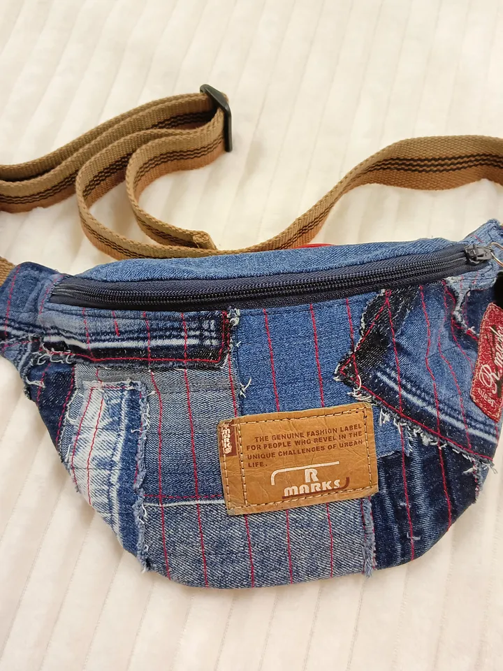 Small comfortable sling bag, handmade fanny pack, denim quilted belt bag of unusual design.