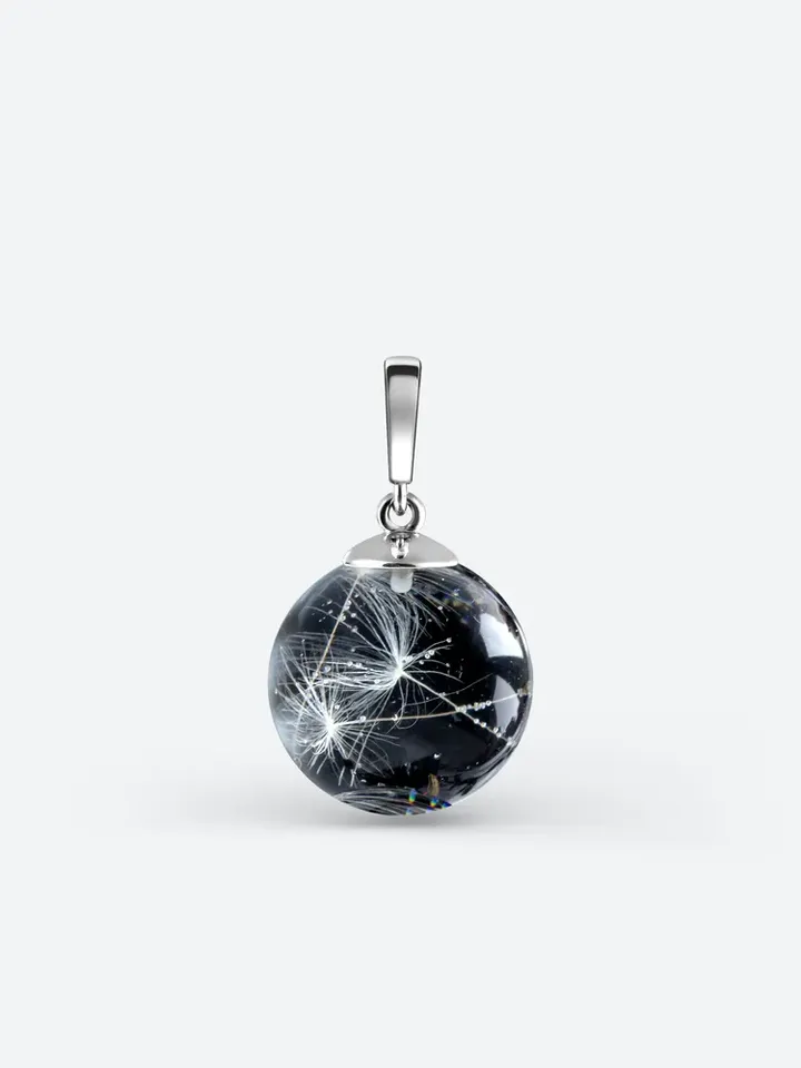 Silver pendant with dandelion