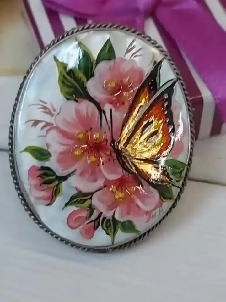 Brooches for women: A delicate butterfly on wild rose blossoms mother of pearl pin, hand painted pink floral brooch made from shell
