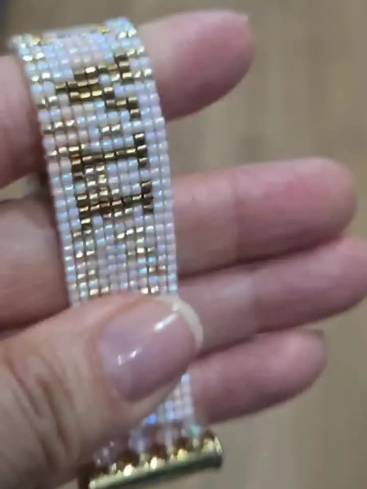 A bracelet with a personalized money code based on your birthdate.