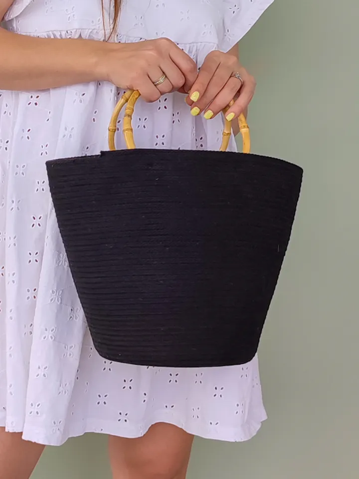 Small black bag with bamboo handles