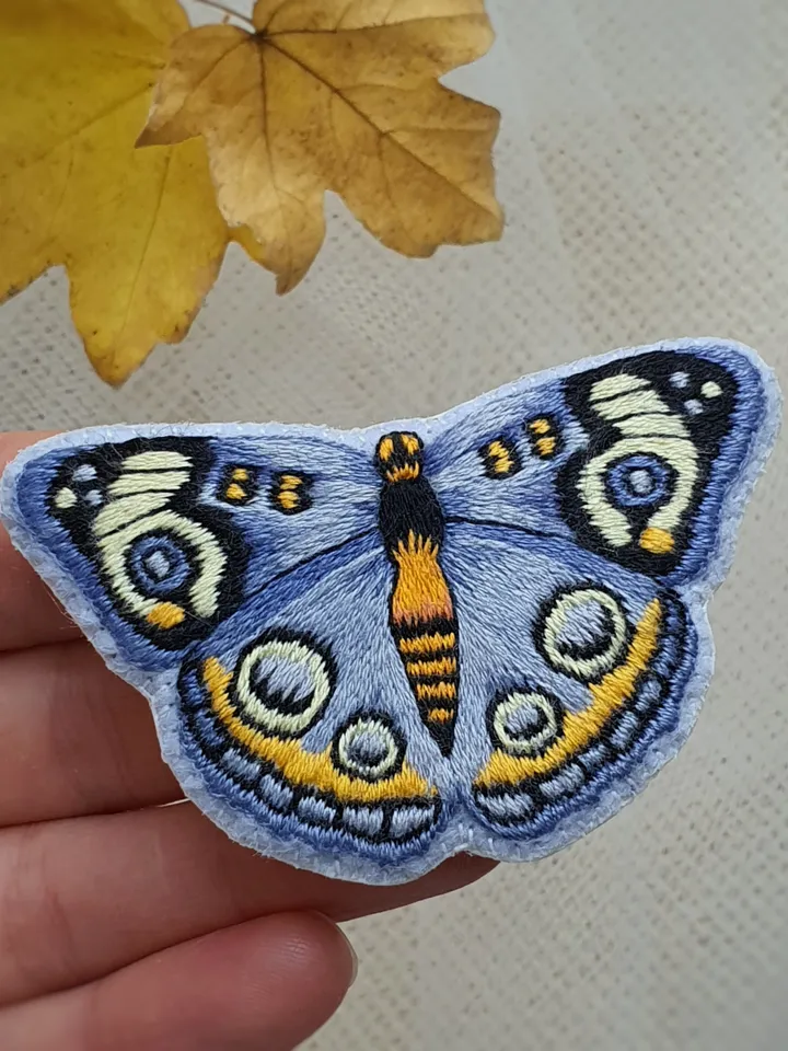 Butterfly Brooch. Embroidered pin brooch. A brooch in the shape of a butterfly.