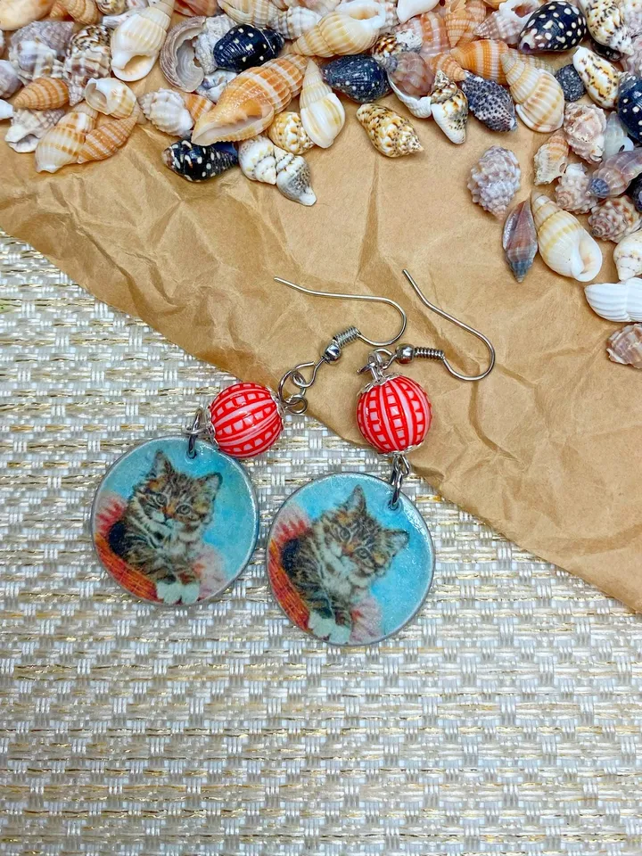 Handmade earrings. Earrings with beads. Handmade. Author's design. Earrings with images of cats.