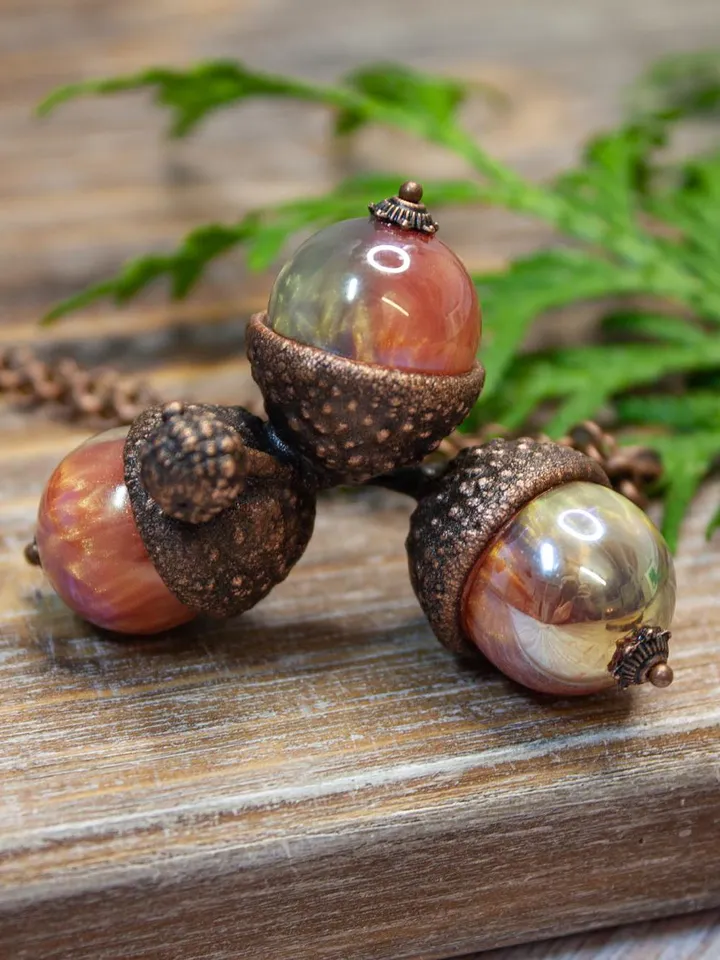An original handmade electroformed copper pendant made from natural acorn caps in a single copy.