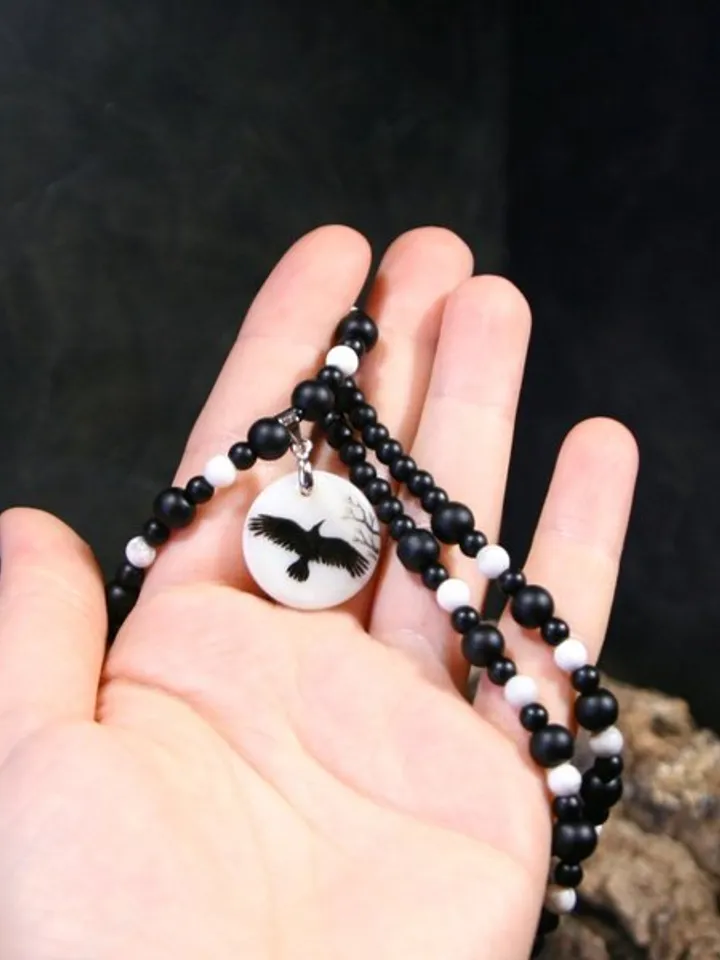 Raven or crow necklace with love rune on the other side. Nacre pearl pendant