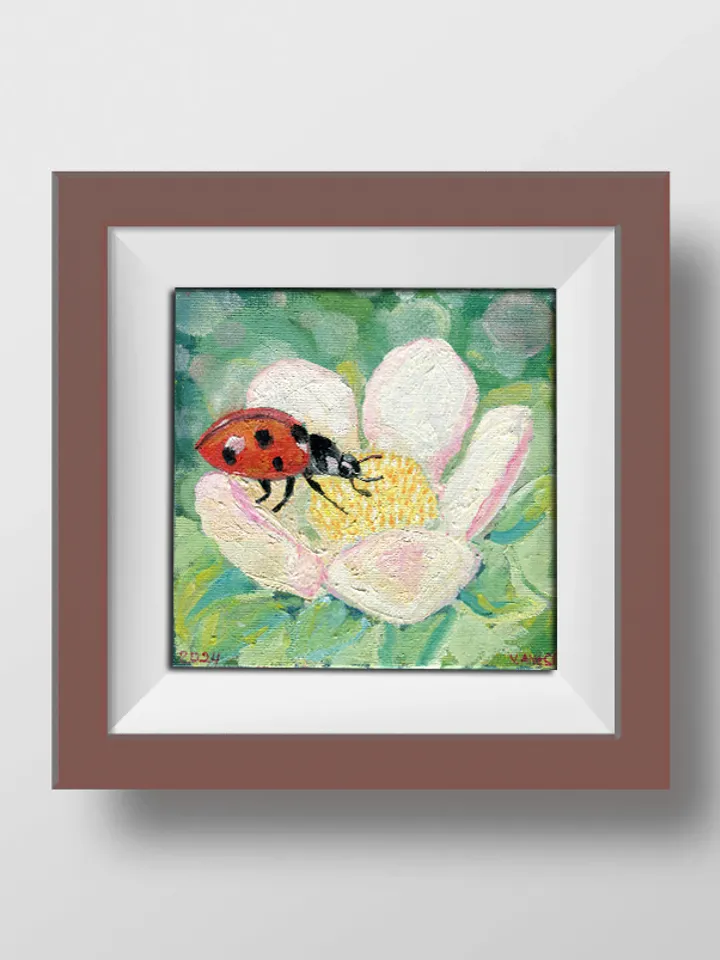 Painting flowers with a Ladybug