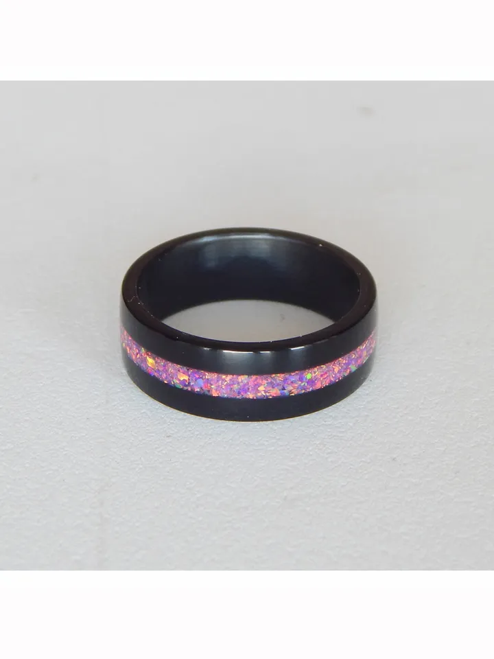 Stylish black ring. Carbon ring with synthetic opal. 7