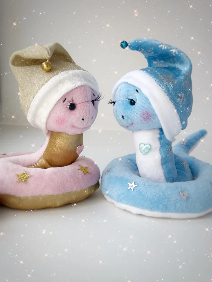 Christmas plush snakes. Handmade cute snakes in holiday hat for home decor. Christmas snakes for gift.