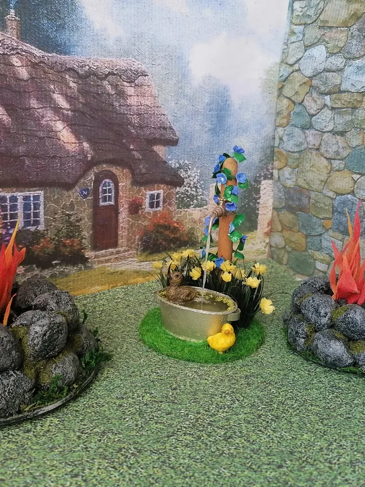Composition for a puppet garden. Dollhouse miniature 1:12.