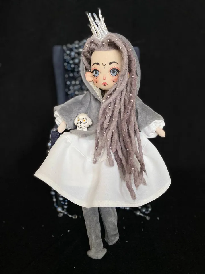 White Queen doll with dreadlocks and tattoos