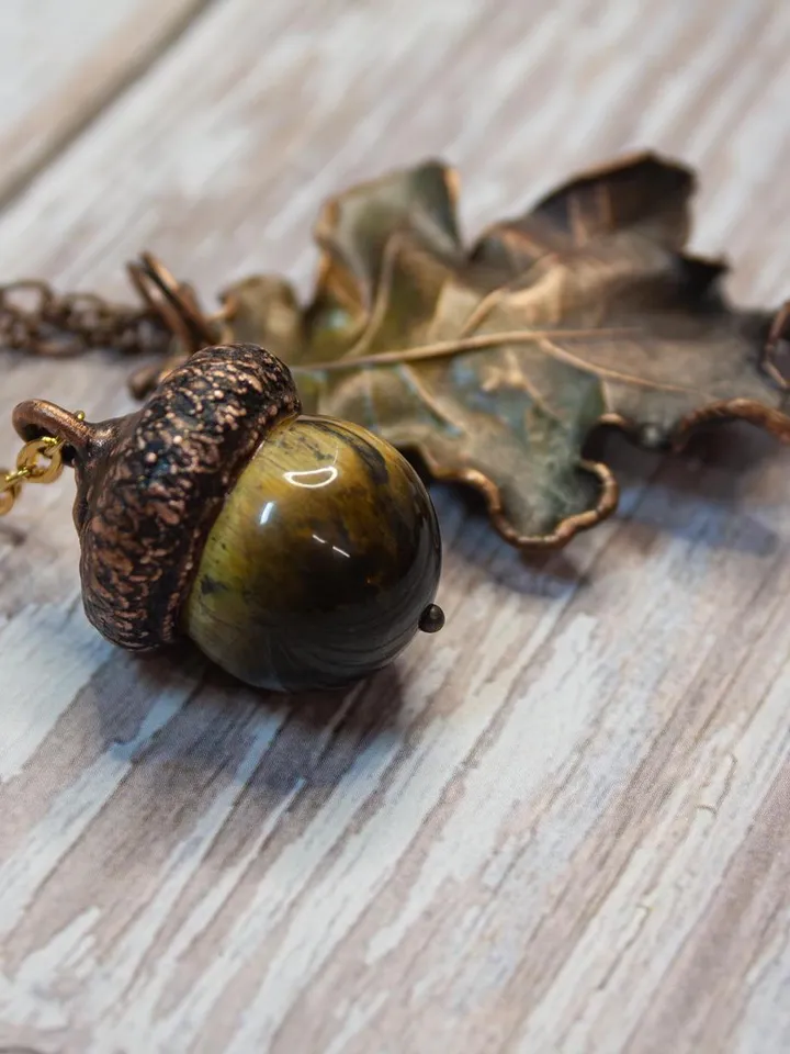 An original handmade electroformed copper pendant made from natural acorn caps in a single copy.