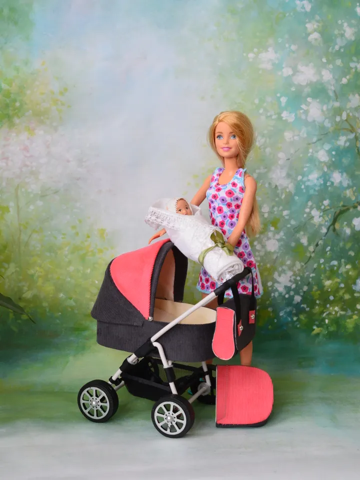 Miniature toy stroller for Barbie dolls.