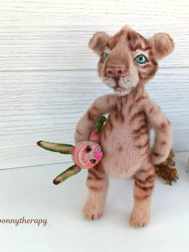 Cute crochet toy tiger cub, stuffed animal with wire frame