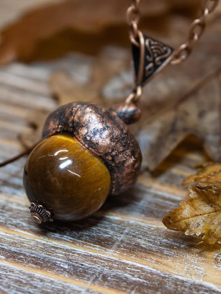 An original handmade electroformed copper pendant made from natural acorn caps in a single copy.